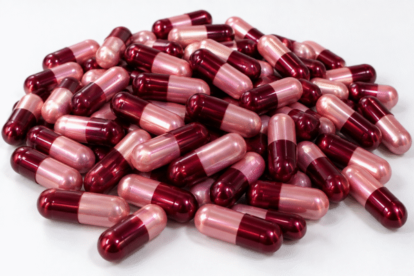 red pink metallic capsules