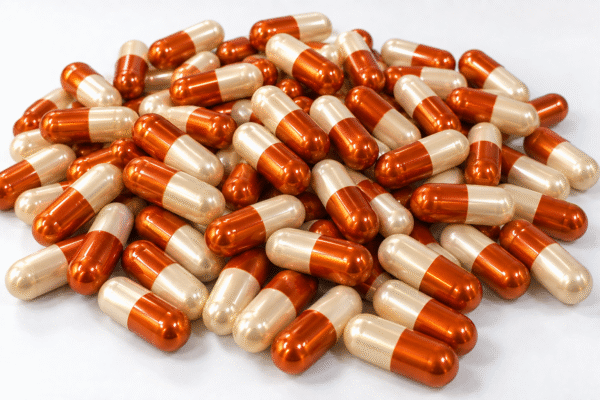 orange metallic capsules